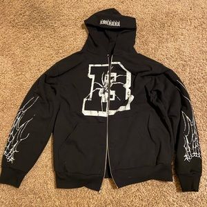 Black zip up Revenge HALLOWEEN DROP
spider webs on sleeve Large